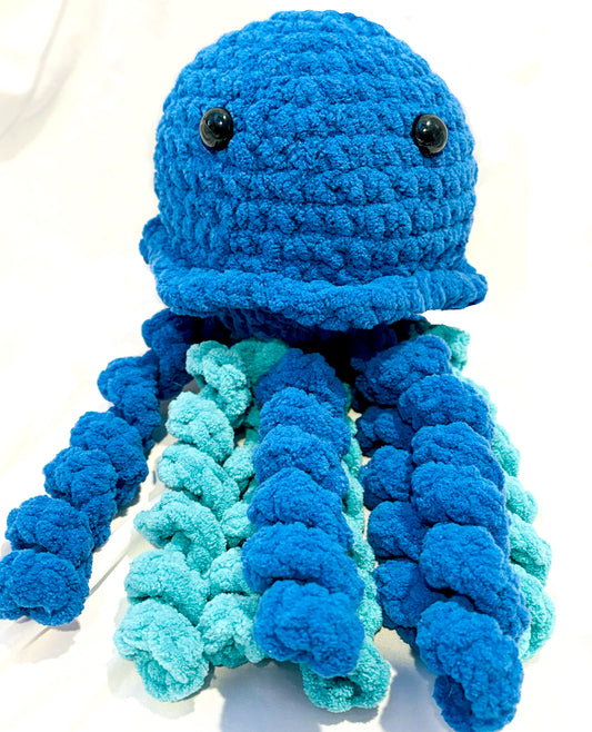 Adorable crochet Jellyfish plushie collectibles are hand crafted by Anya, MarVia Square's youngest artisan. Made with the softest acrylic yarn. If there is a specific color combination you would like, it can be custom made upon request. Dimensions: 6" wide, 12.5" high Hand wash or dry clean only Consciously made in California