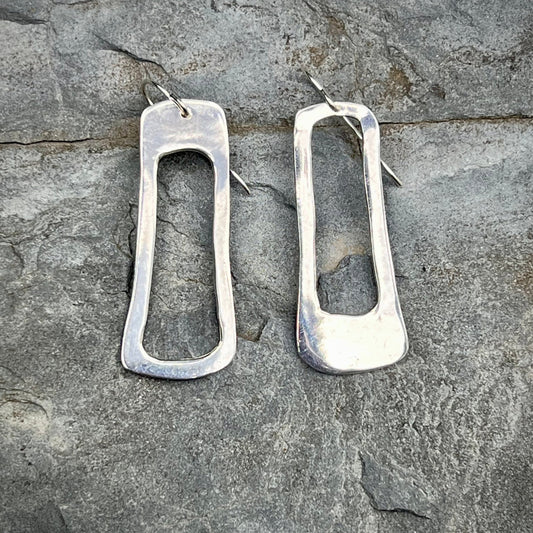 The Marlow Earrings are striking, delicate and light. Each pair is carefully cut, filed and smoothed to a mirror finish. Clean regularly with polishing pad or soft cloth and mild soap Consciously made in New York