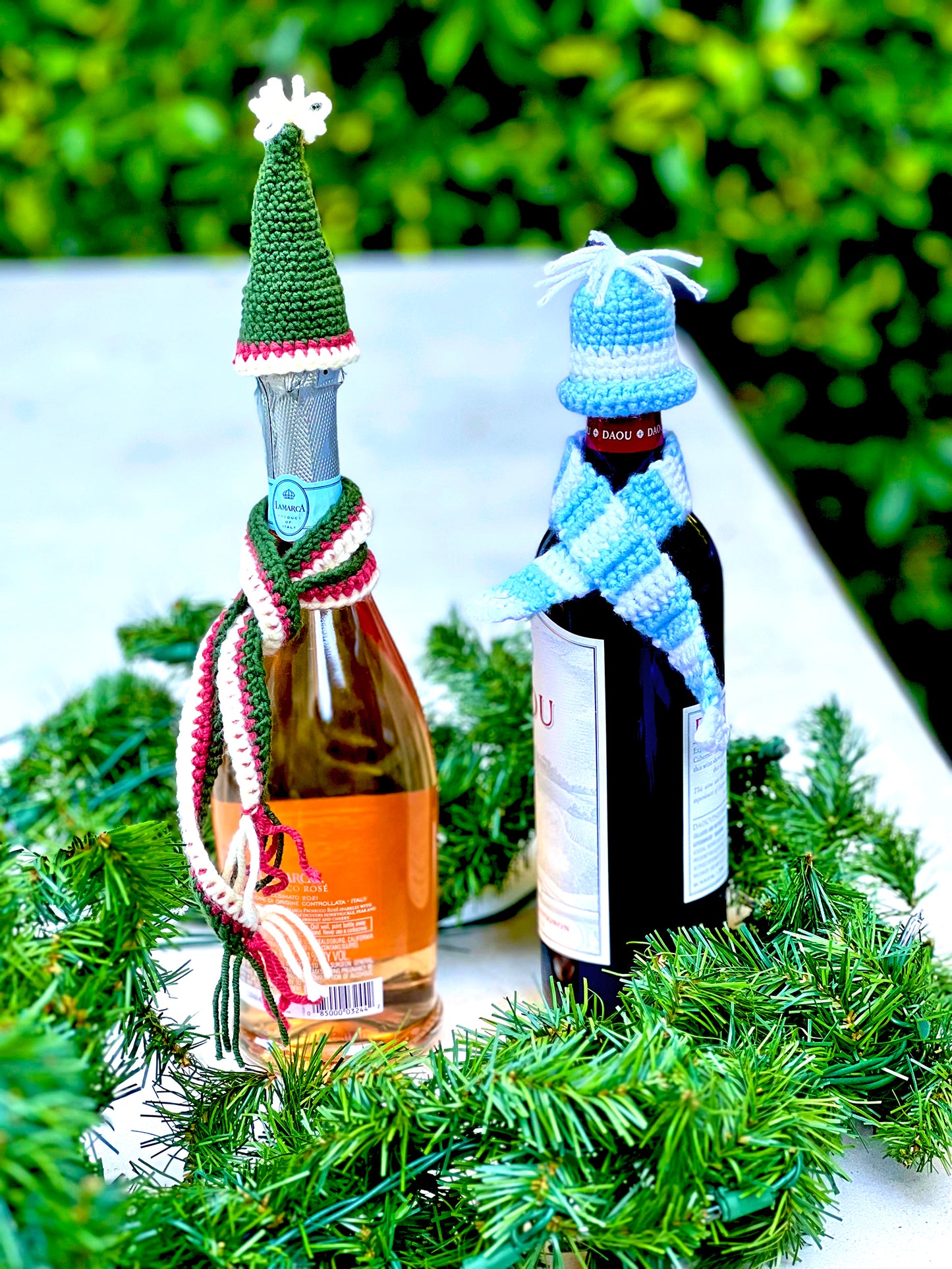 These knitted wine bottle topper hat & scarf sets make gift giving more fun. Made from upcycled acrylic yarn in three different festive styles. Made to order, please allow 3 to 7 days depending how many sets are ordered. Colors may also vary depending on availability. Acrylic yarn Hand wash cold, line dry Handmade in California