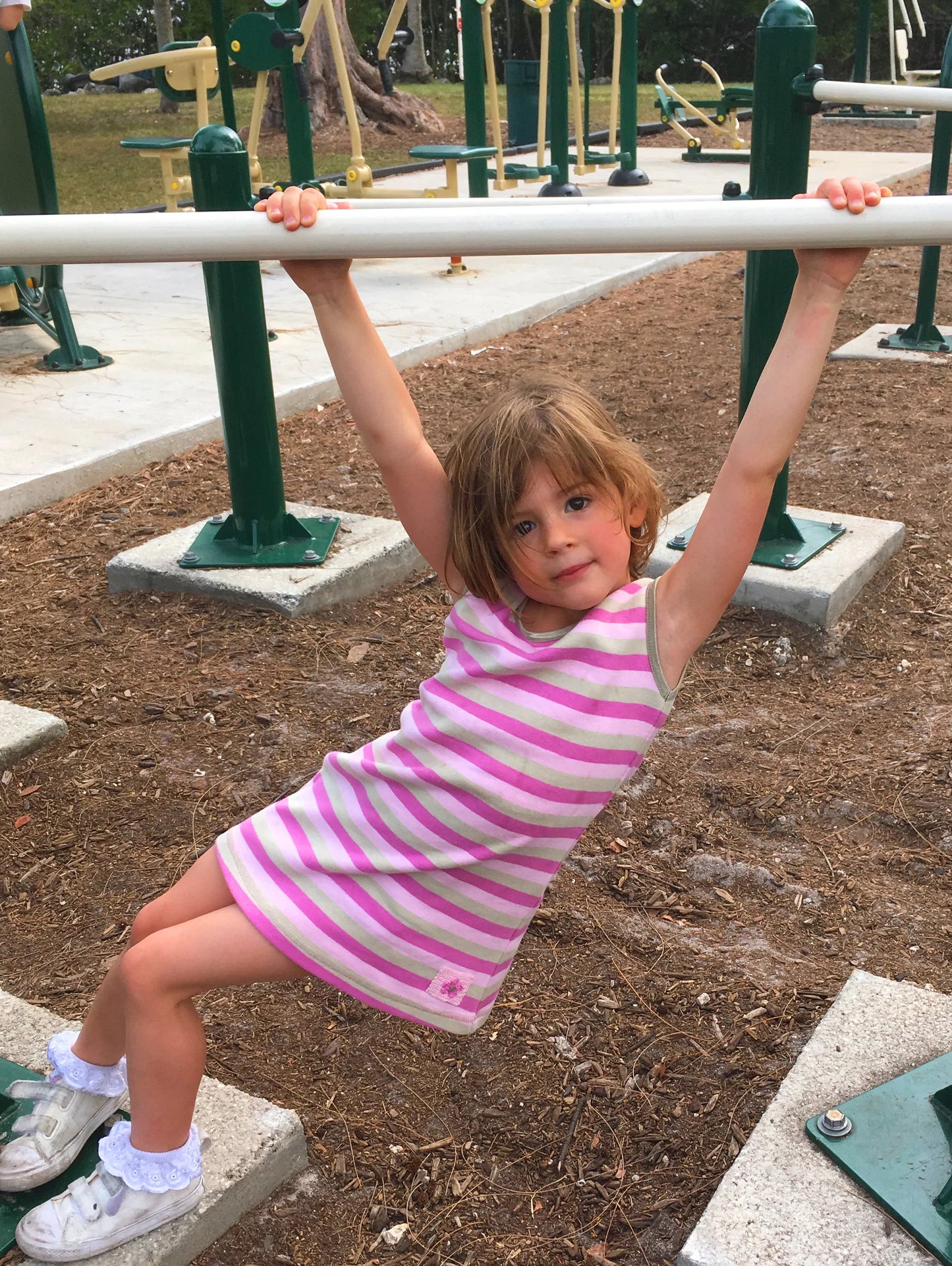 This cute & comfy, toddler tank dress is perfect for play. Made of soft combed cotton, rib knit with satin elastic binding on neckline and armholes, and hand crocheted flower applique on the hem. Color: Laguna Stripe Machine wash cold, Low heat Made in the Jammin' USA